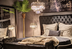 hazenkamp-bedroom-velvet-bed-with-head-panel-crystal-lamps.jpg