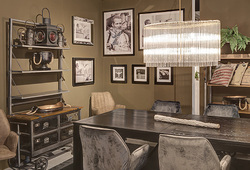 hazenkamp-dining-table-industrial-cabinets-paul-newmann-art-on-the-wall.jpg