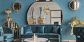 hazenkamp-livingroom-blue-sofa-blue-interior-xxl-mirror-round-gold-home-decoration.jpg